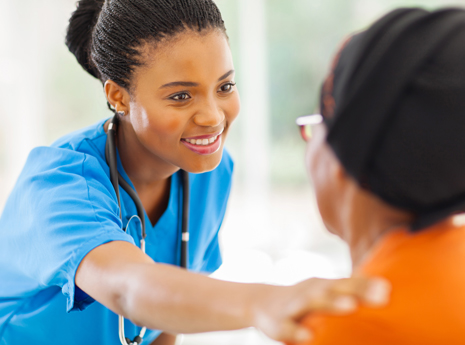 Nurse Helping Woman Nurse Helping Woman